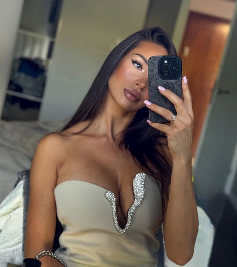 Sandra in sexy beige dress