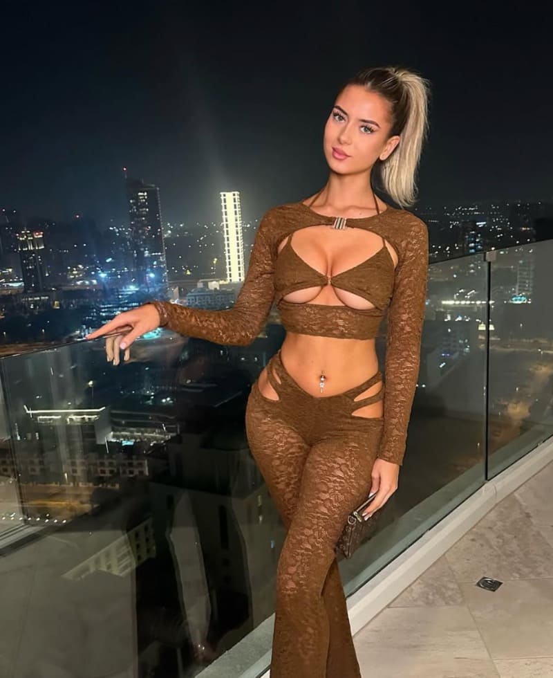 Daniella in brown with nice tits