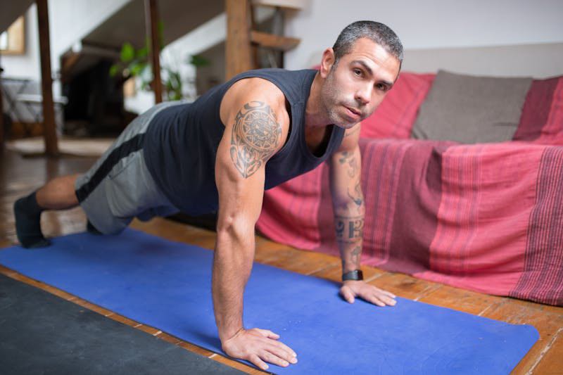 Man working out from home