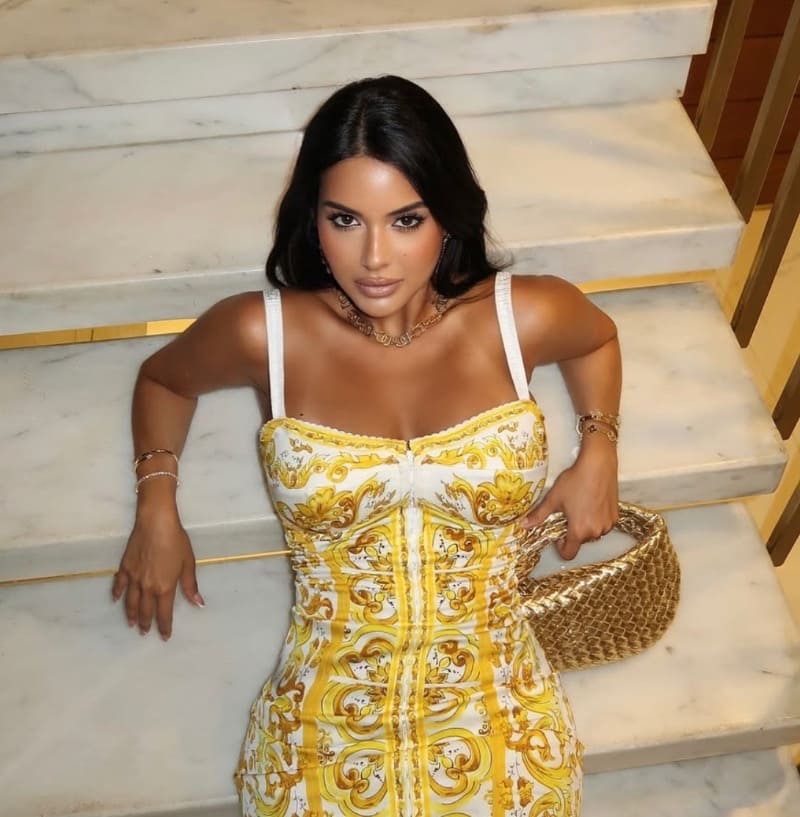 Sexy brunette in yellow