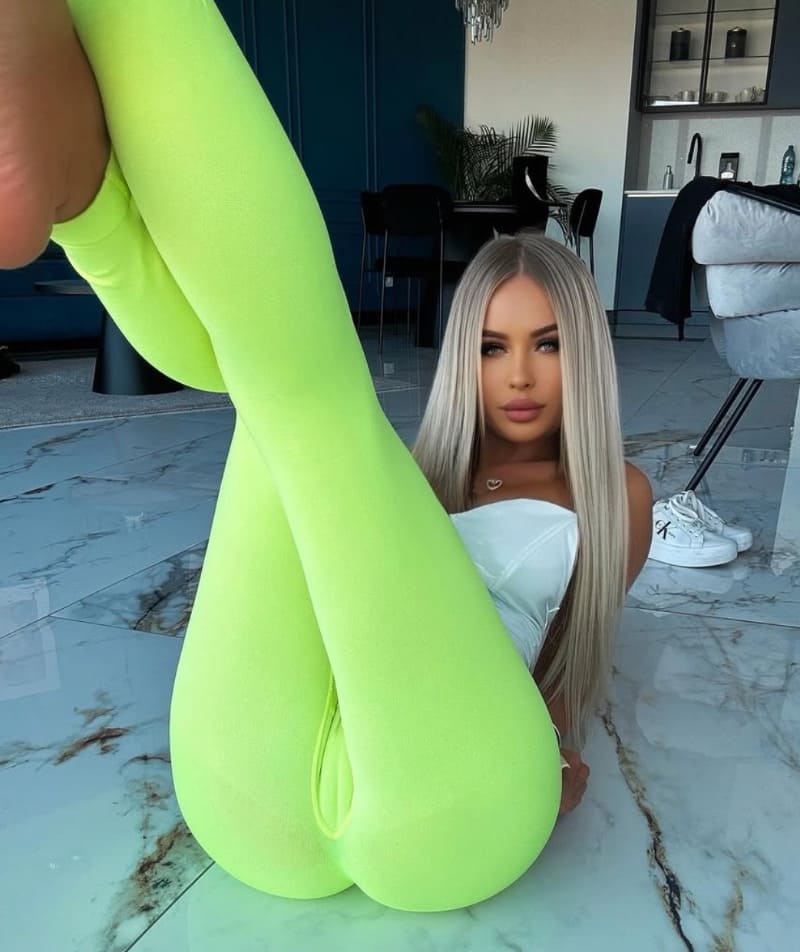 Sexy woman in green yoga pants