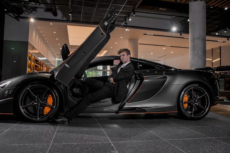 Person in sportscar