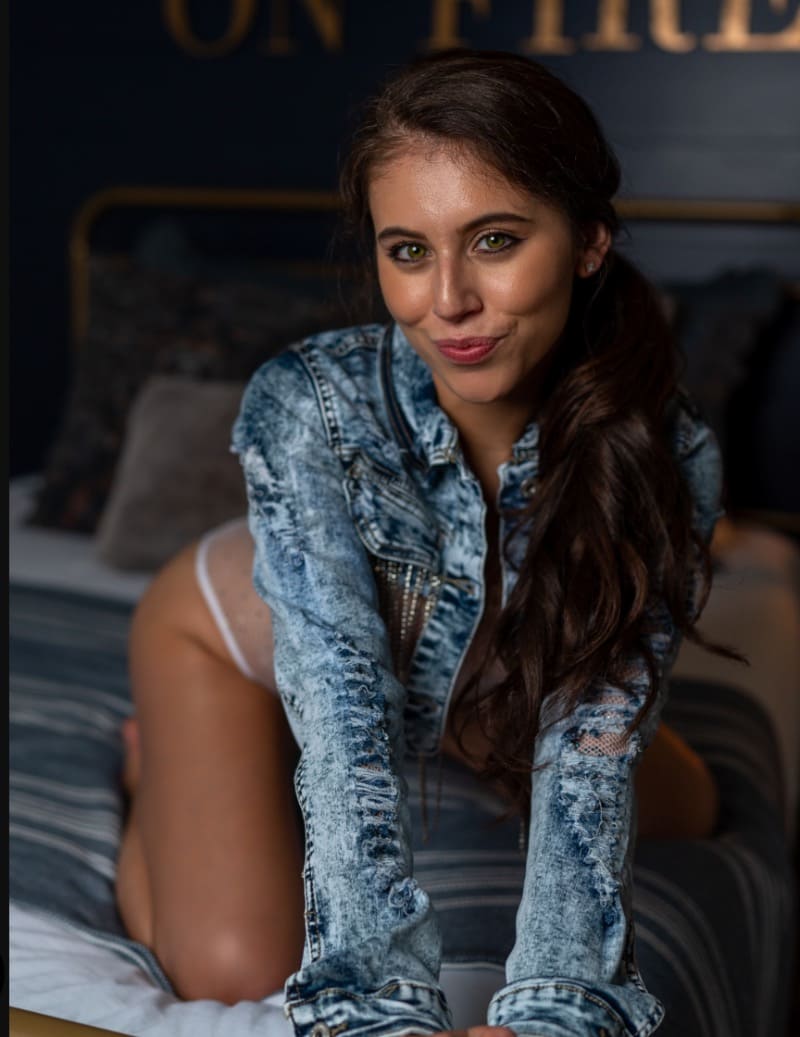 Violet sitting seductively