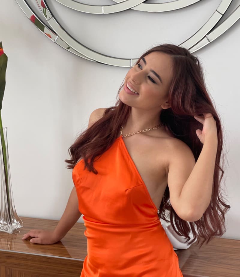 Babe in orange dress