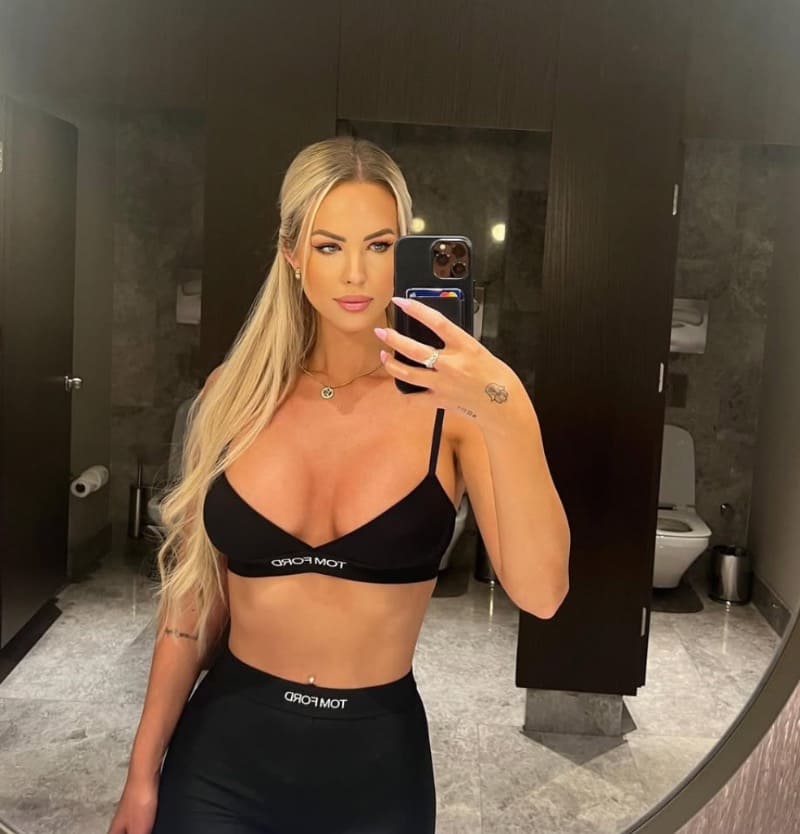 Sexy blonde in hot outfit