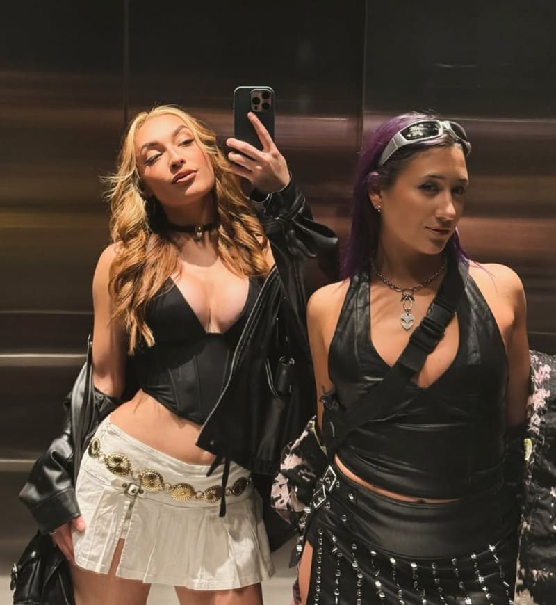 Sexy women taking mirror selfie