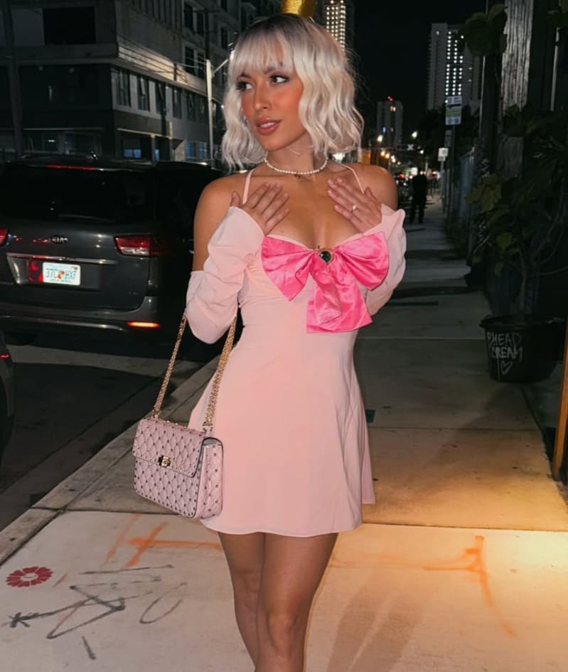 Sexy streamer girl in pink dress