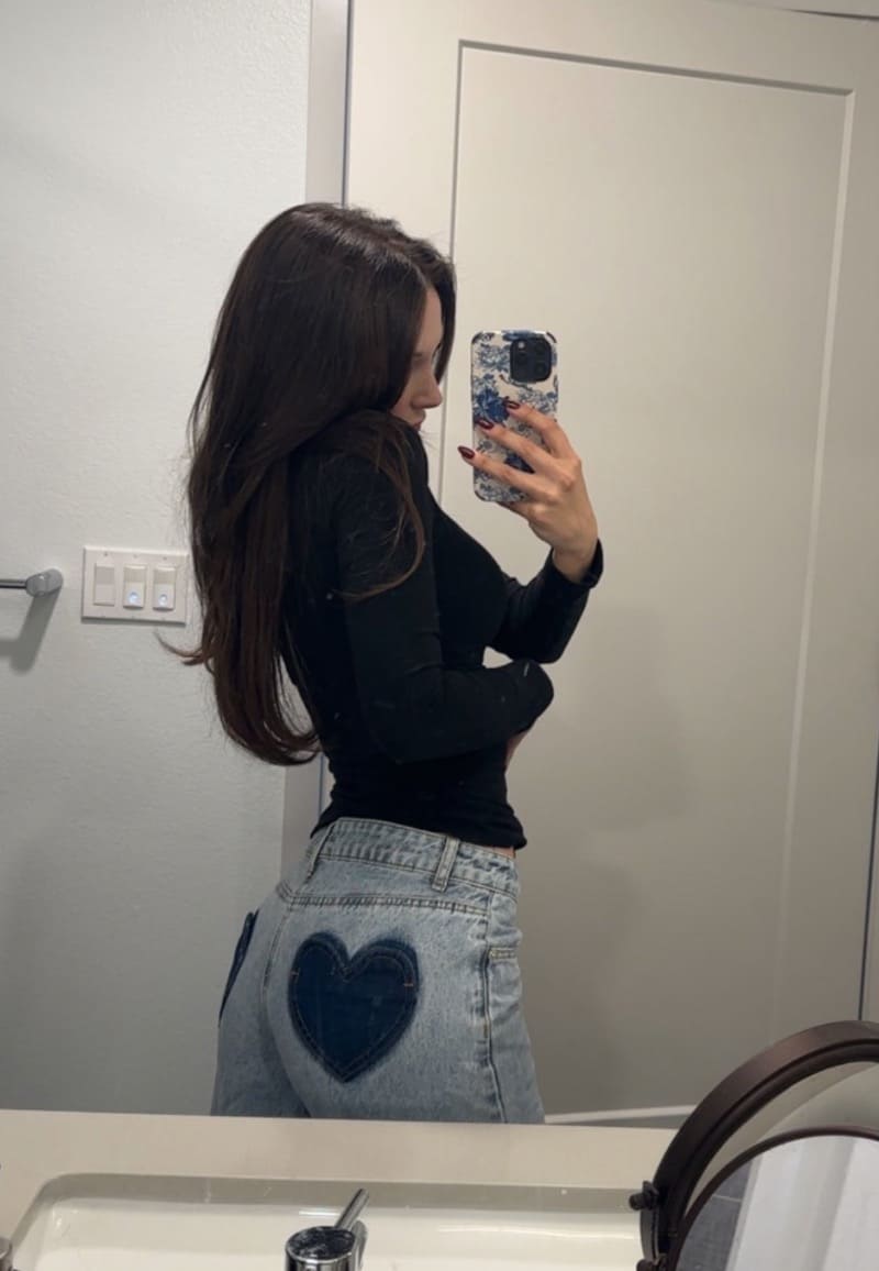 Natalie in jeans and tight top