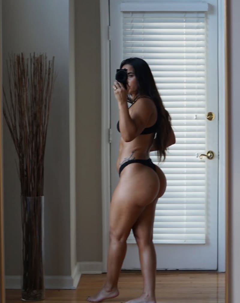 Hot fitness model in sexy outfit