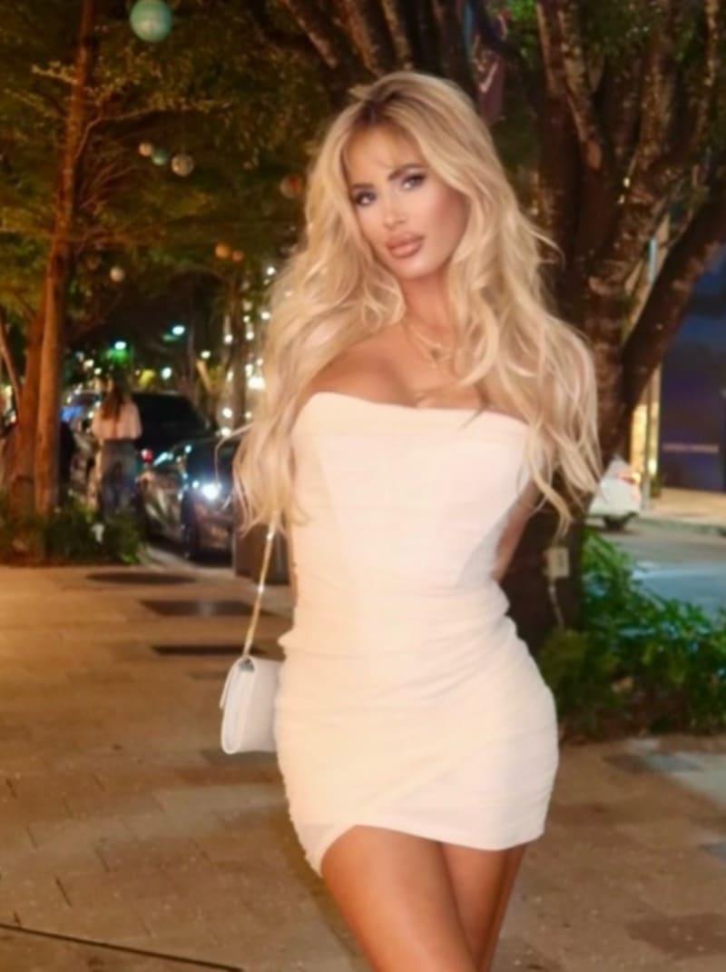 Sexy woman in white dress