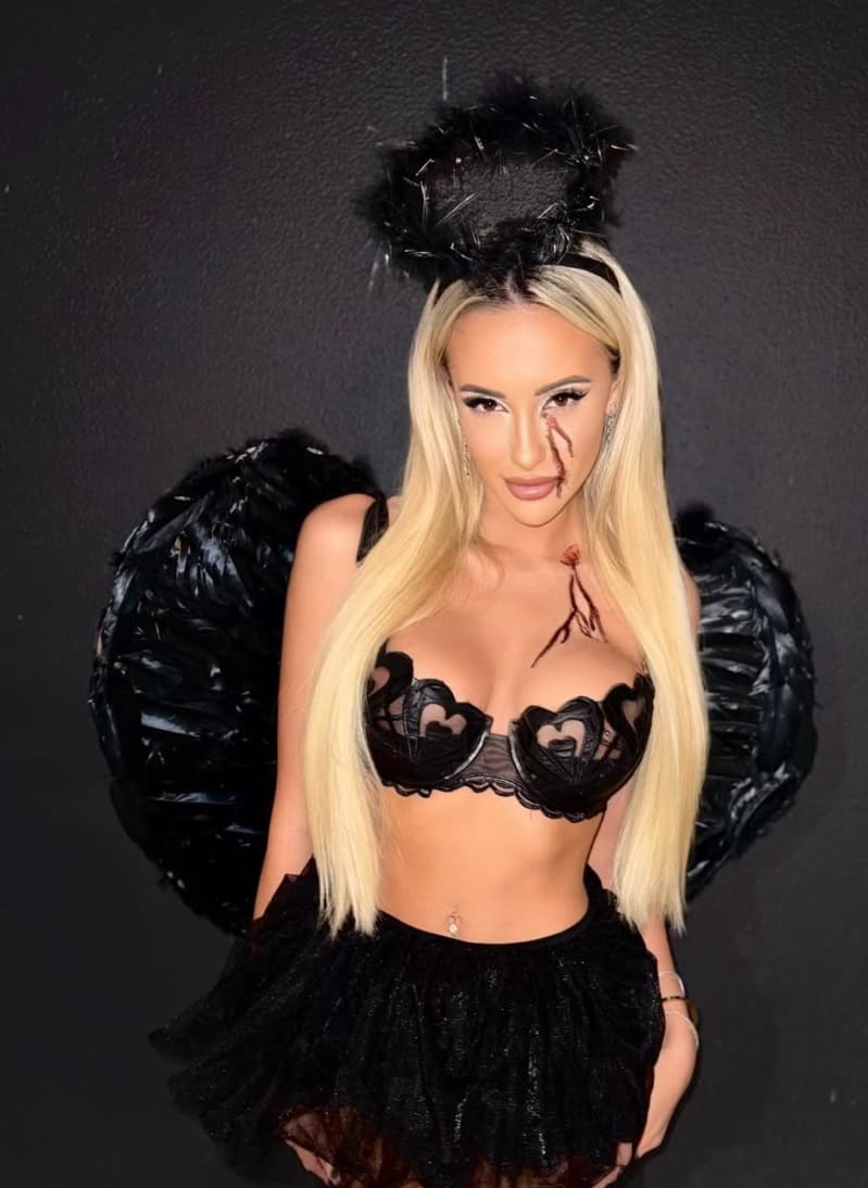 Babe in dark angel costume