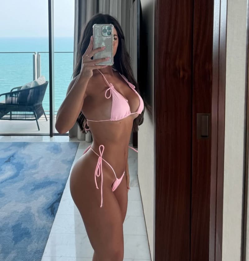 Milly shows off nice ass