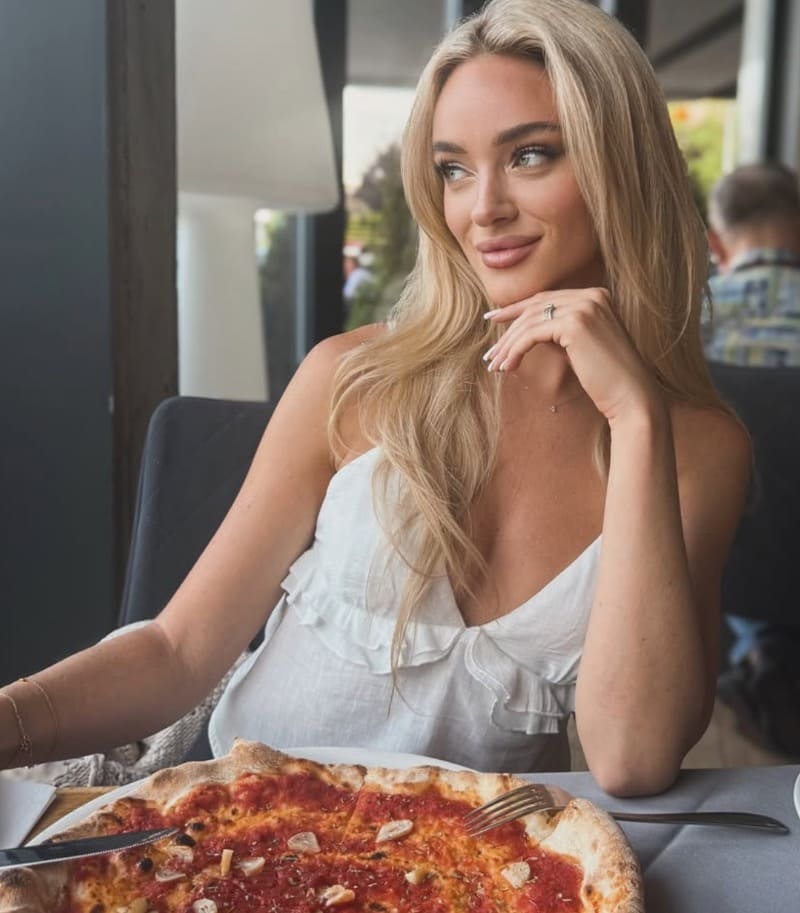 Kamila in sexy white dress eating lunch