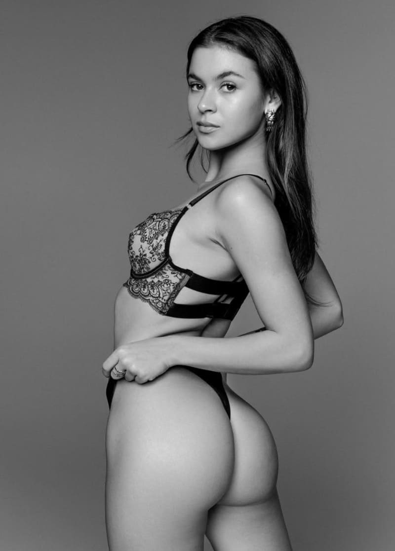 Brunette with perfect ass in lingerie black and white