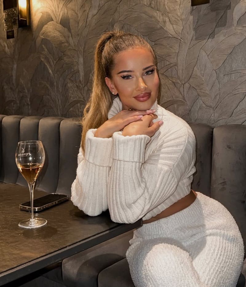 Jacquelina in sexy white top