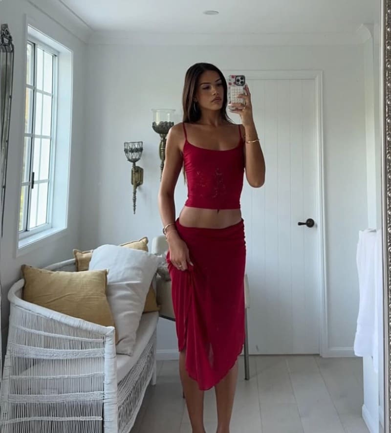 Riley in tight long skirt and tight top