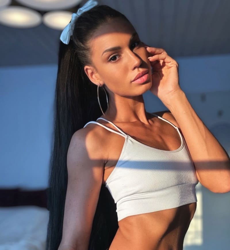 Christy in tight white top