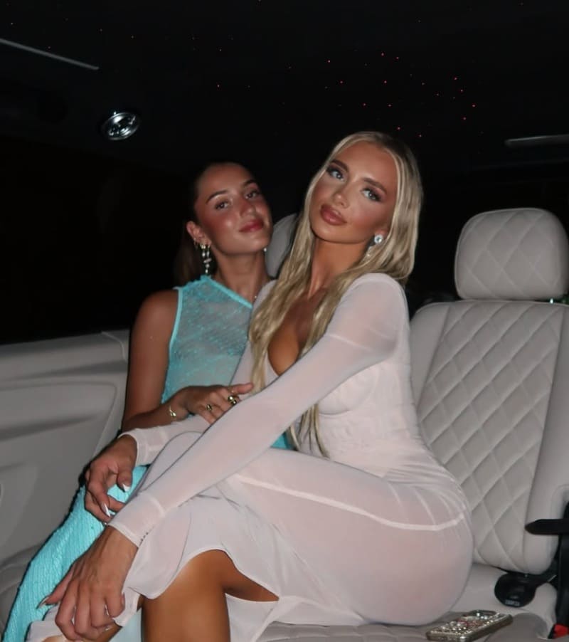 Sexy women in car with nice dresses