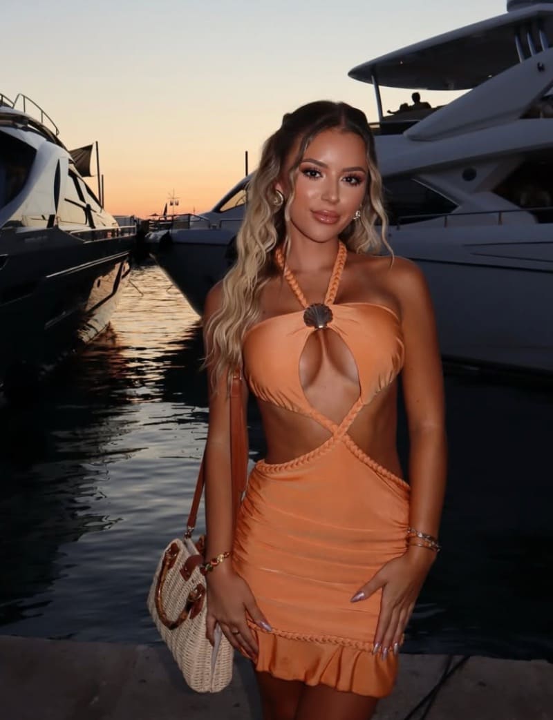 Ashlyn in sexy orange dress with nice figure