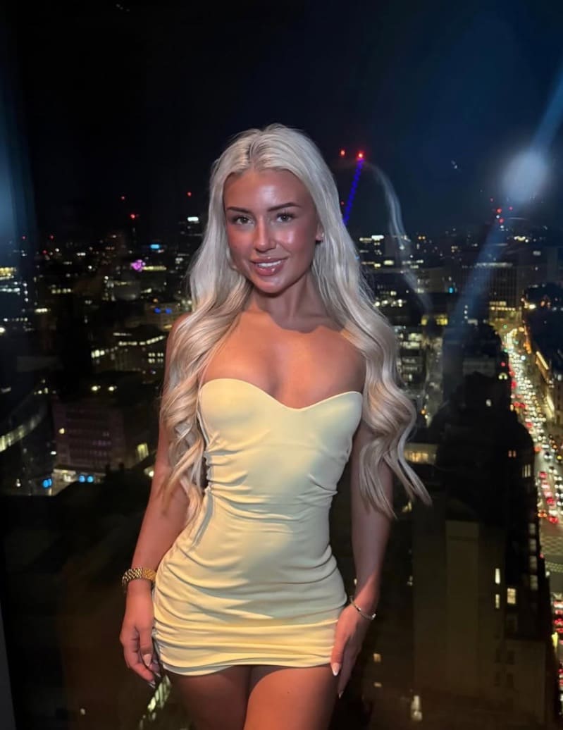 Sexy blonde in yellow dress