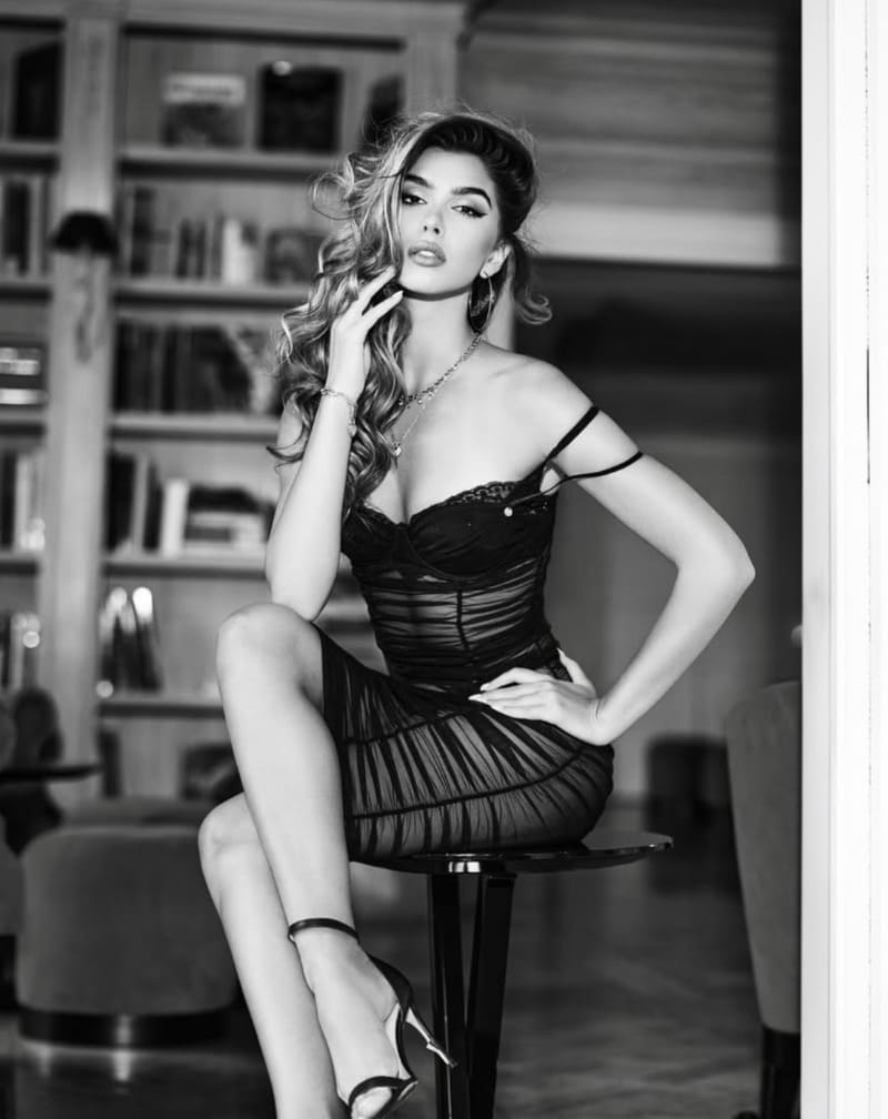 Sexy woman in black short skirt