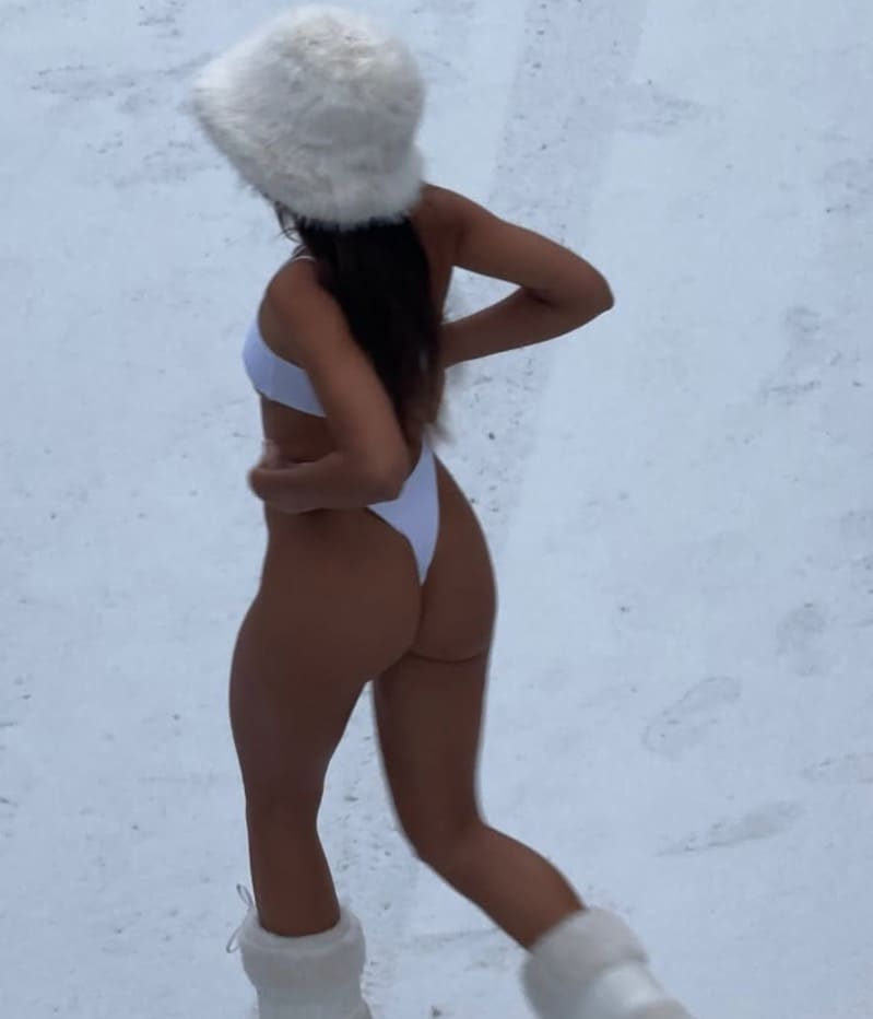 Amelia outside in lingerie in snow