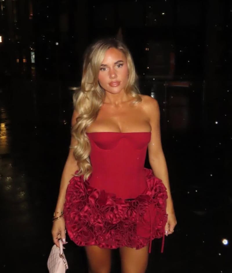 Hot blonde in short red dress