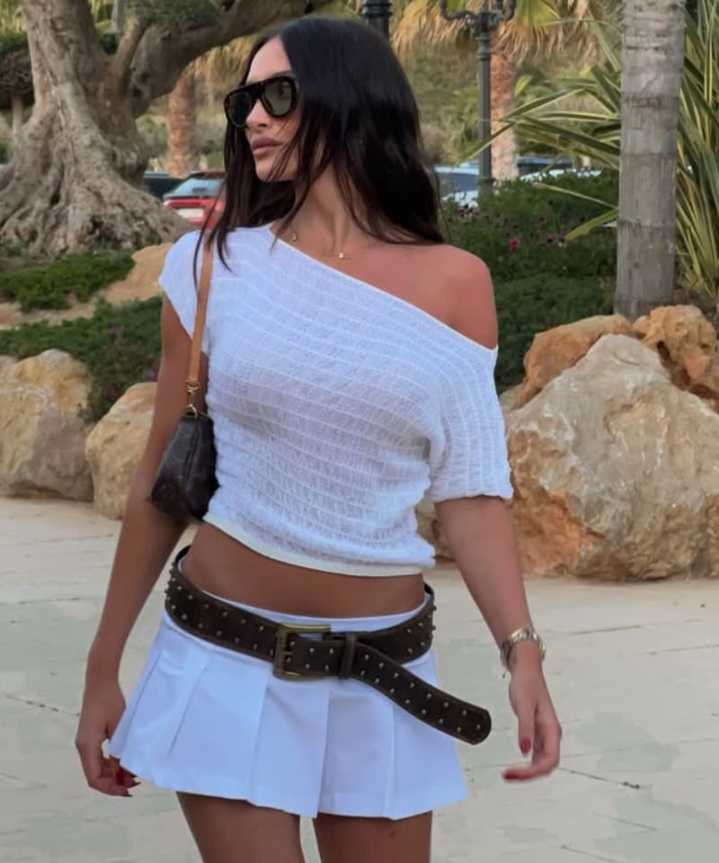 Sexy model in white skirt