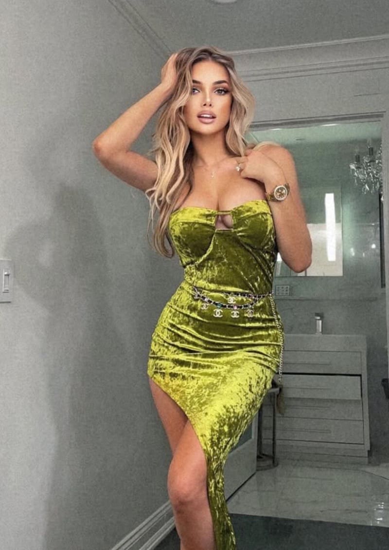 Hot blonde in green dress