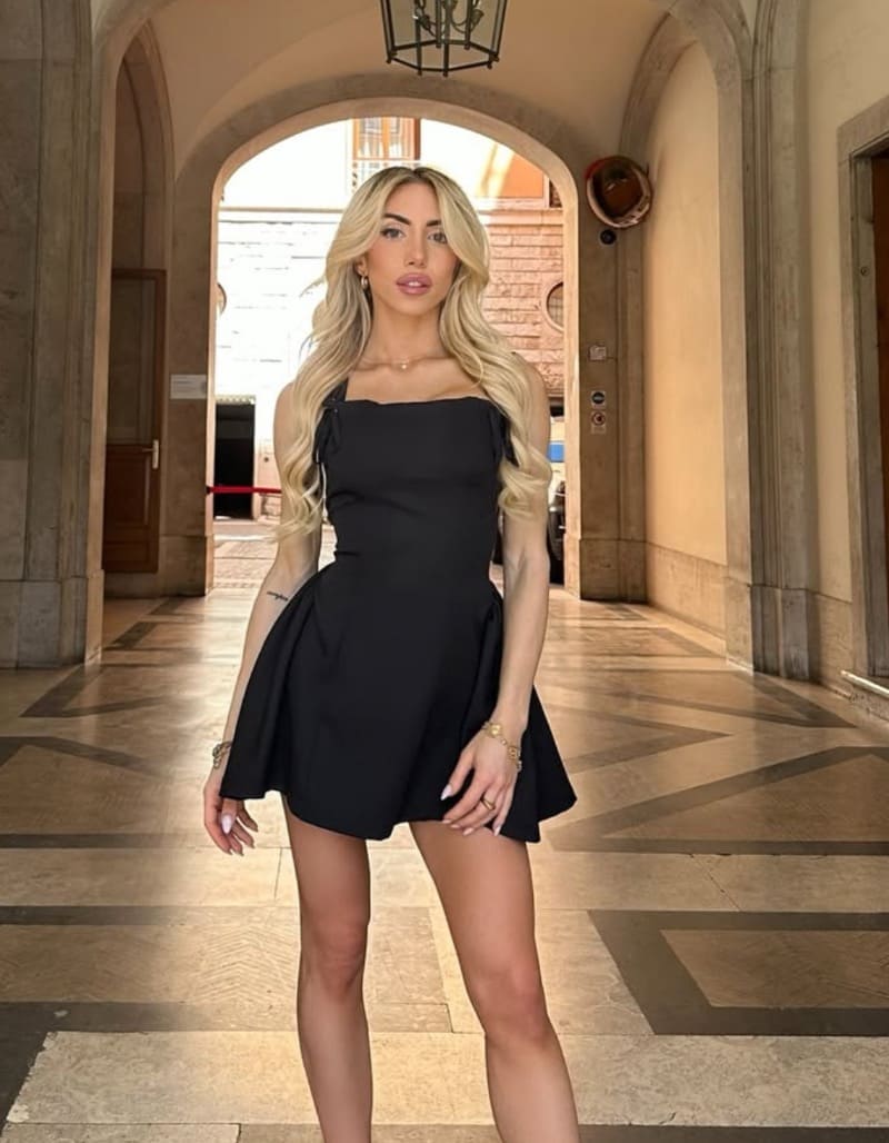 Hot blonde in black dress