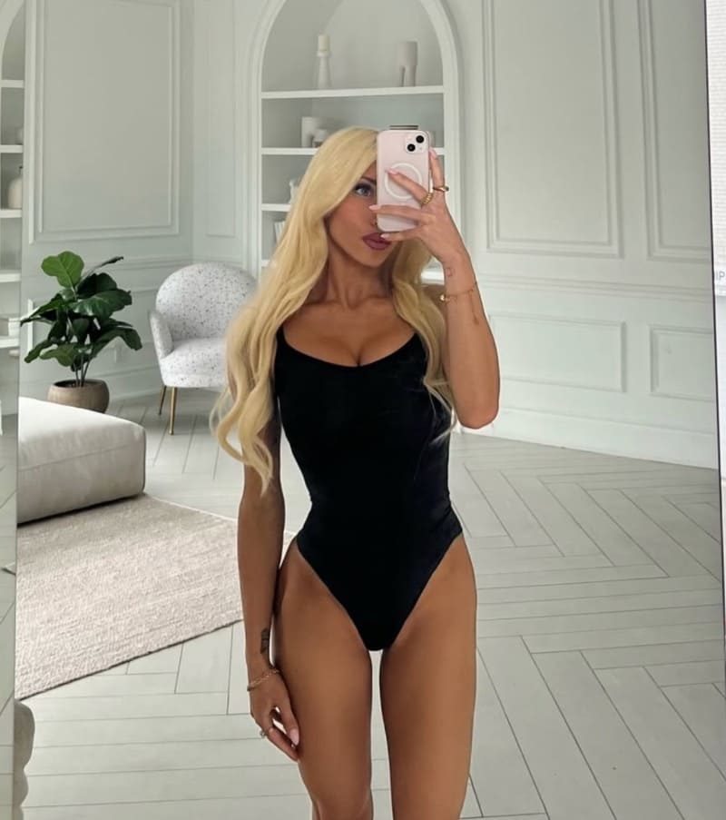 Sexy model in black bathing suit