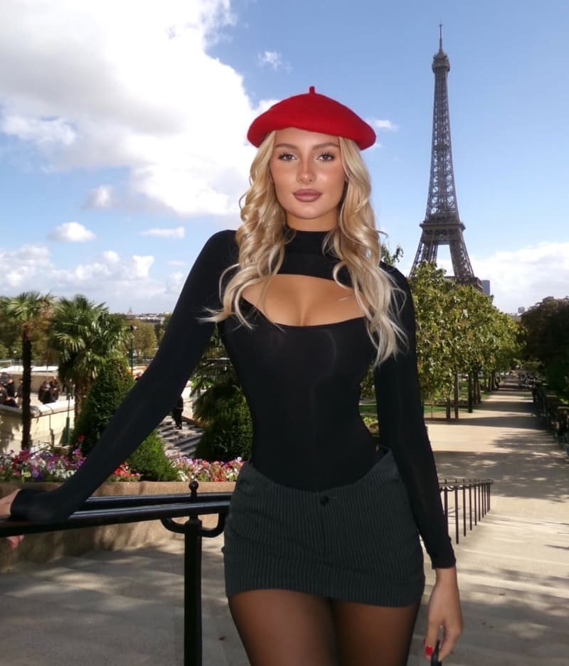 Babe in sexy black dress with nice cleavage