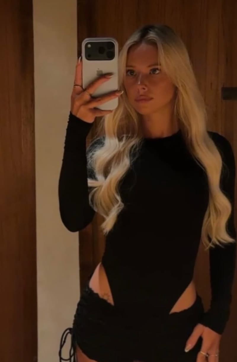 Sexy model in black tight outfit