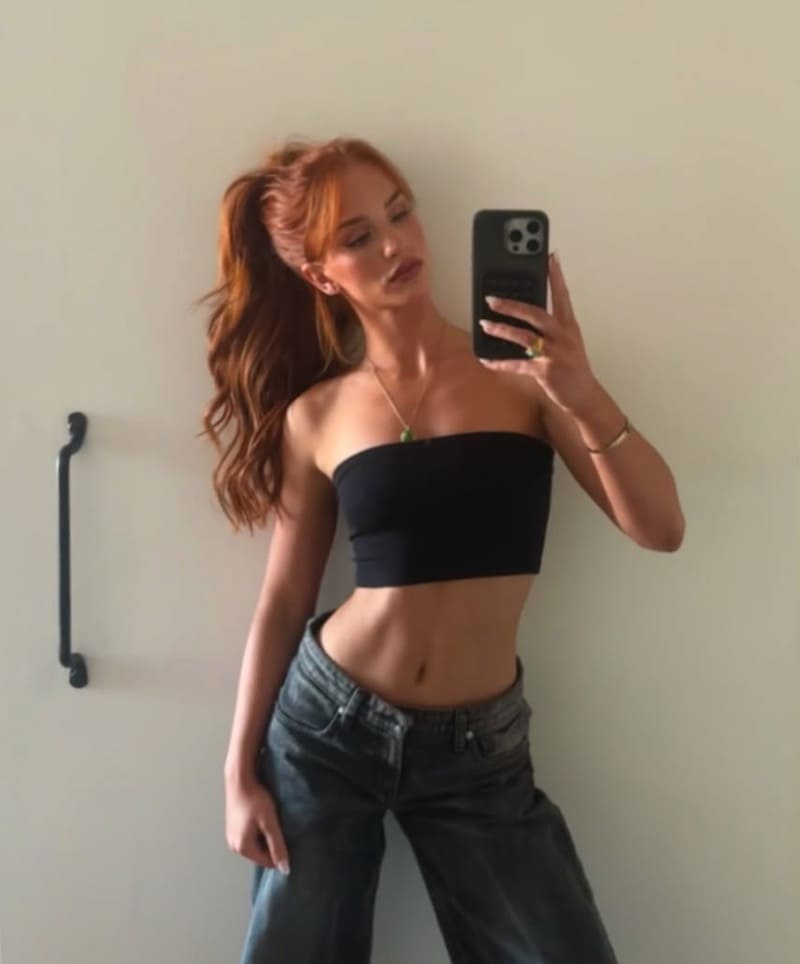 Babe in black top with jeans 