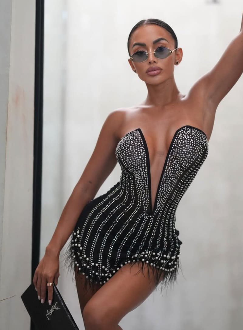 Sexy model in diamond dress