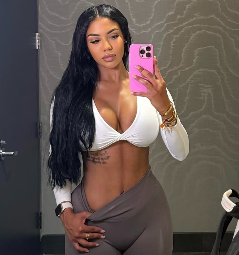 Sexy brunette showing off fitness results