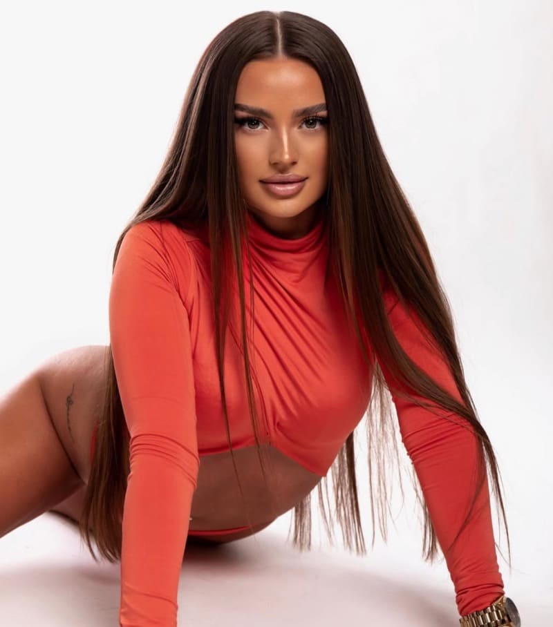 Sexy model in orange top