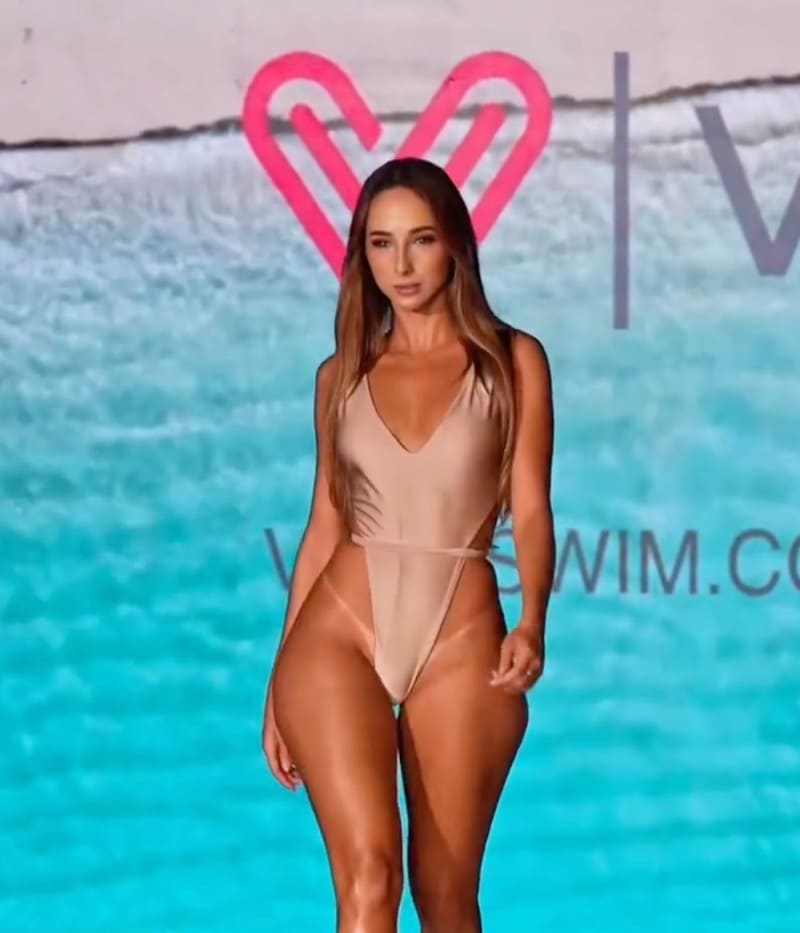 Sexy model in beige bathing suit