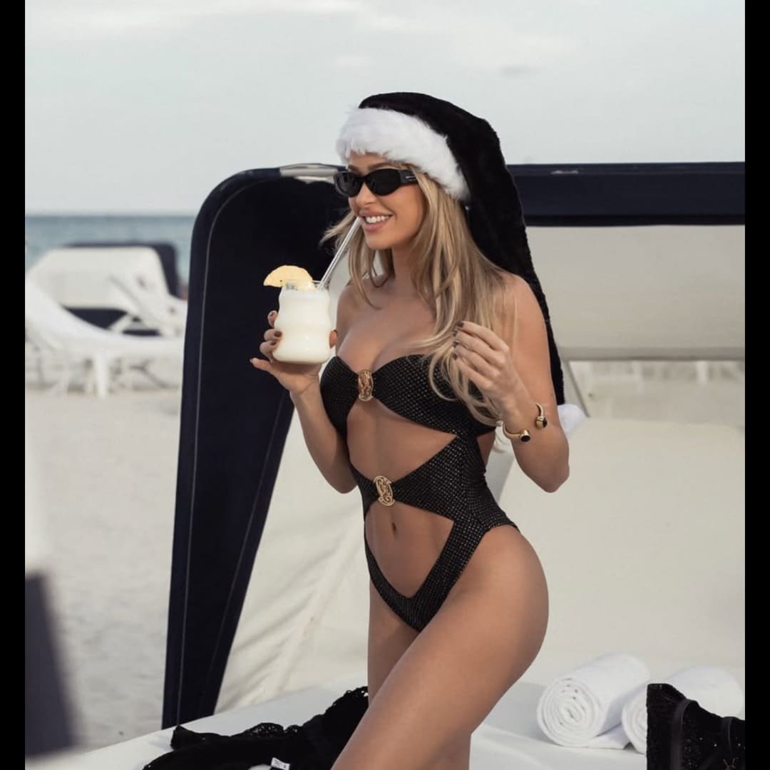 Cindy in black bathing suit on boat