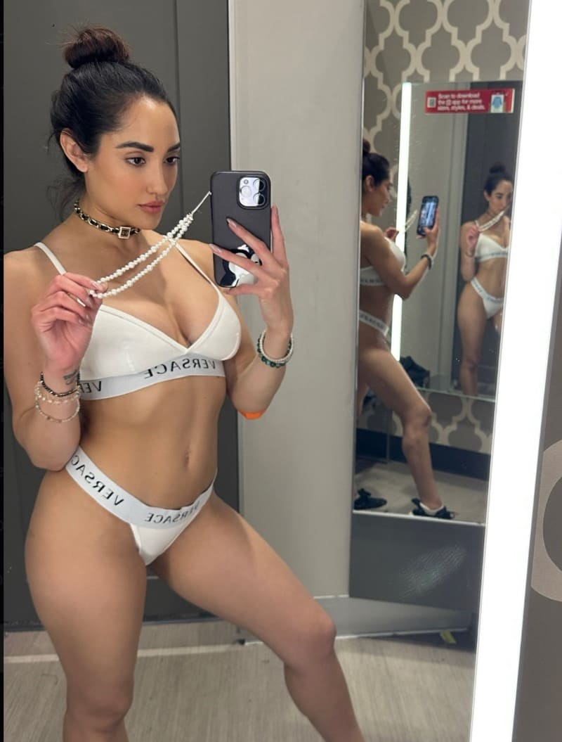 Chloe in white lingerie in mirror picture