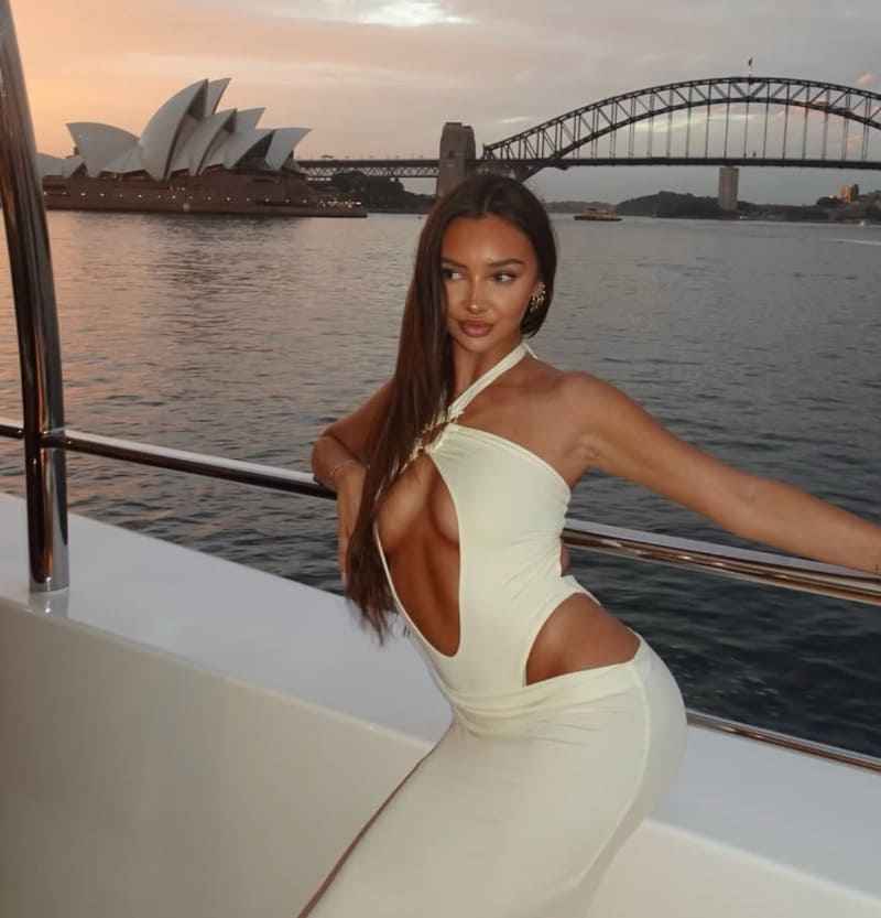 Babe in tight dress on boat