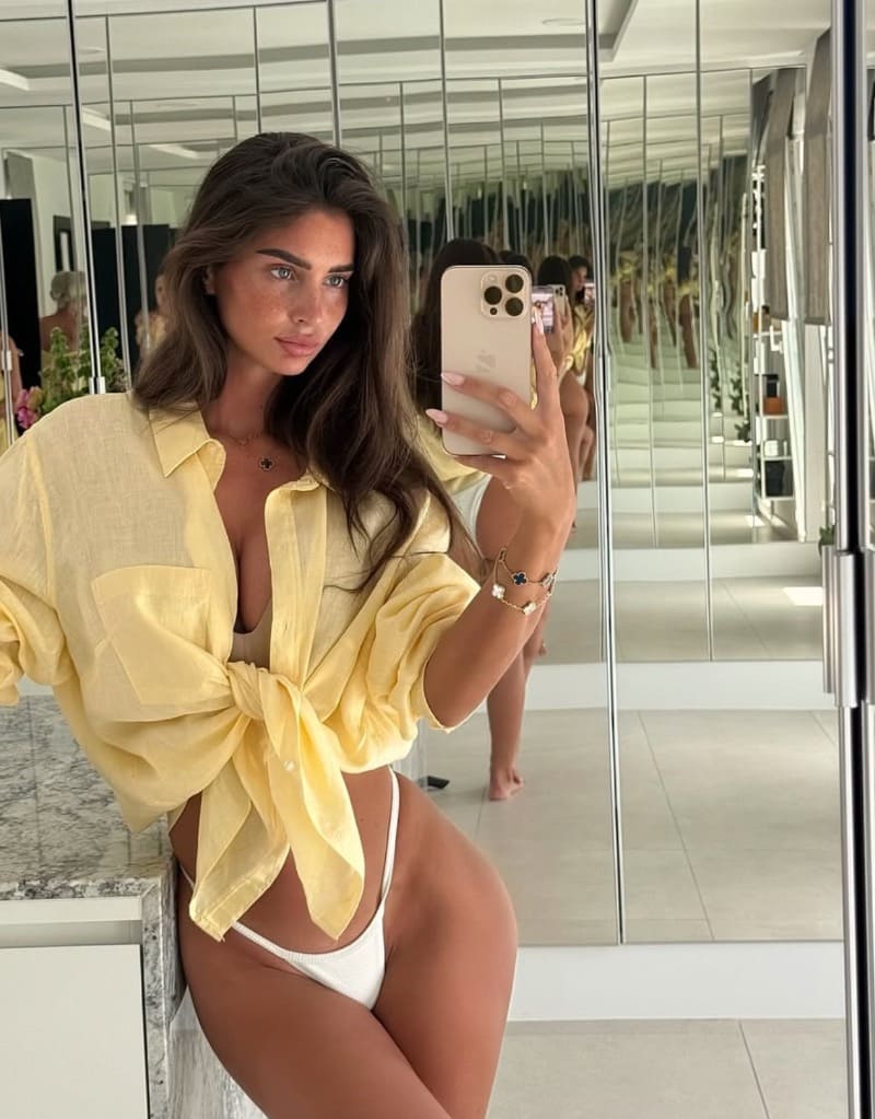 Madeleine in sexy yellow top