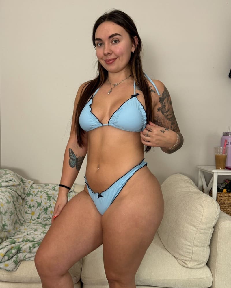 Sexy model in blue pants