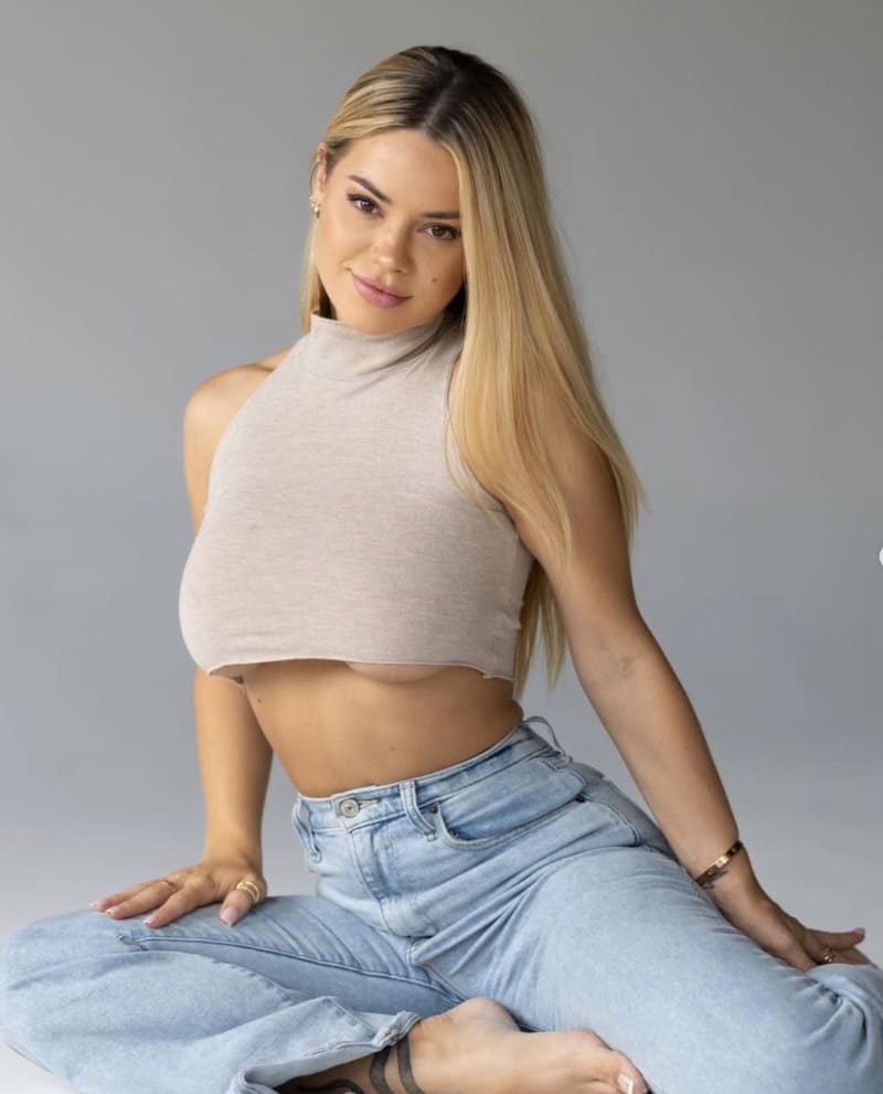Ali in beige top and jeans