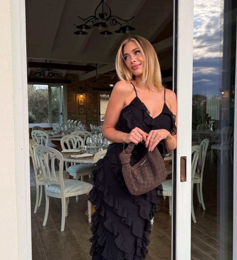 Maria in tight black dress