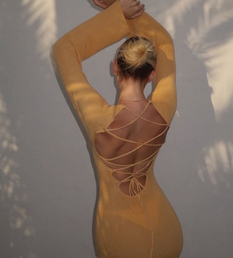 Blinde in tight dress