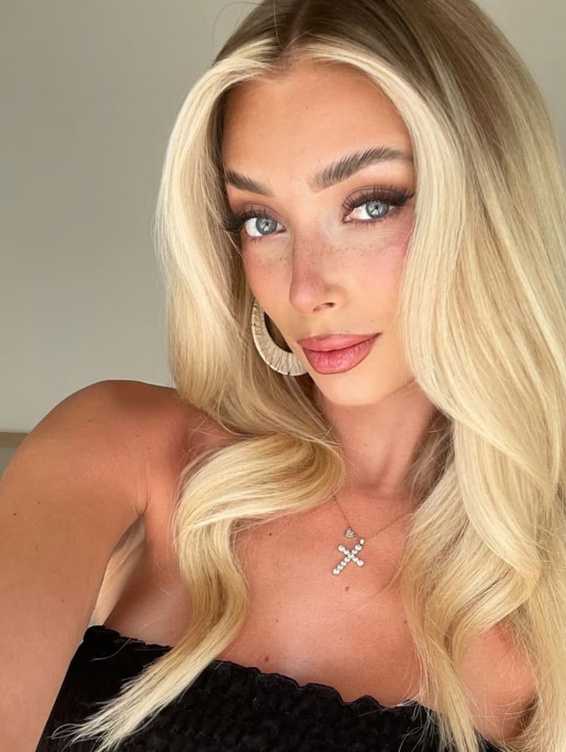 Sexy blonde taking selfie