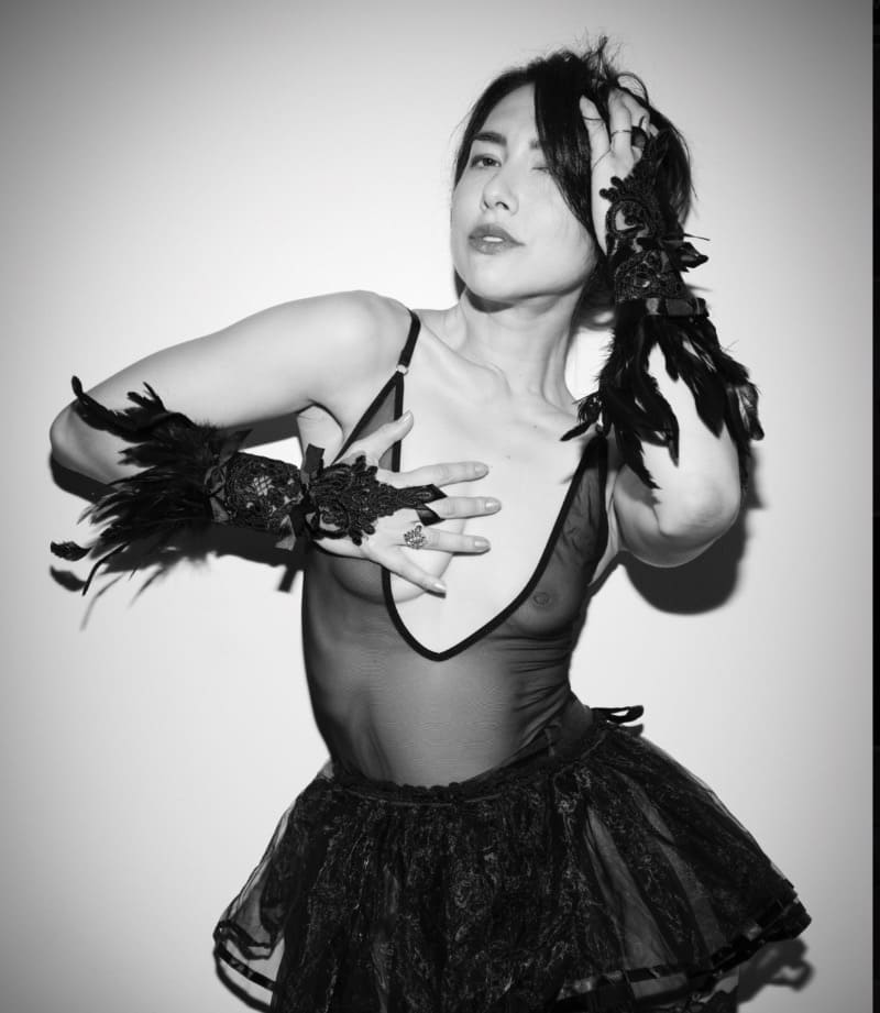 Sexy brunette with nice tits in see through dress