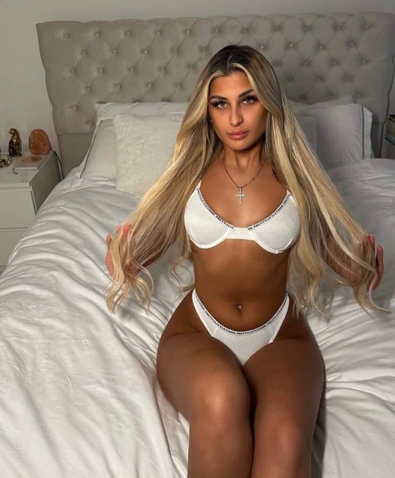 Babe in tight white bikini