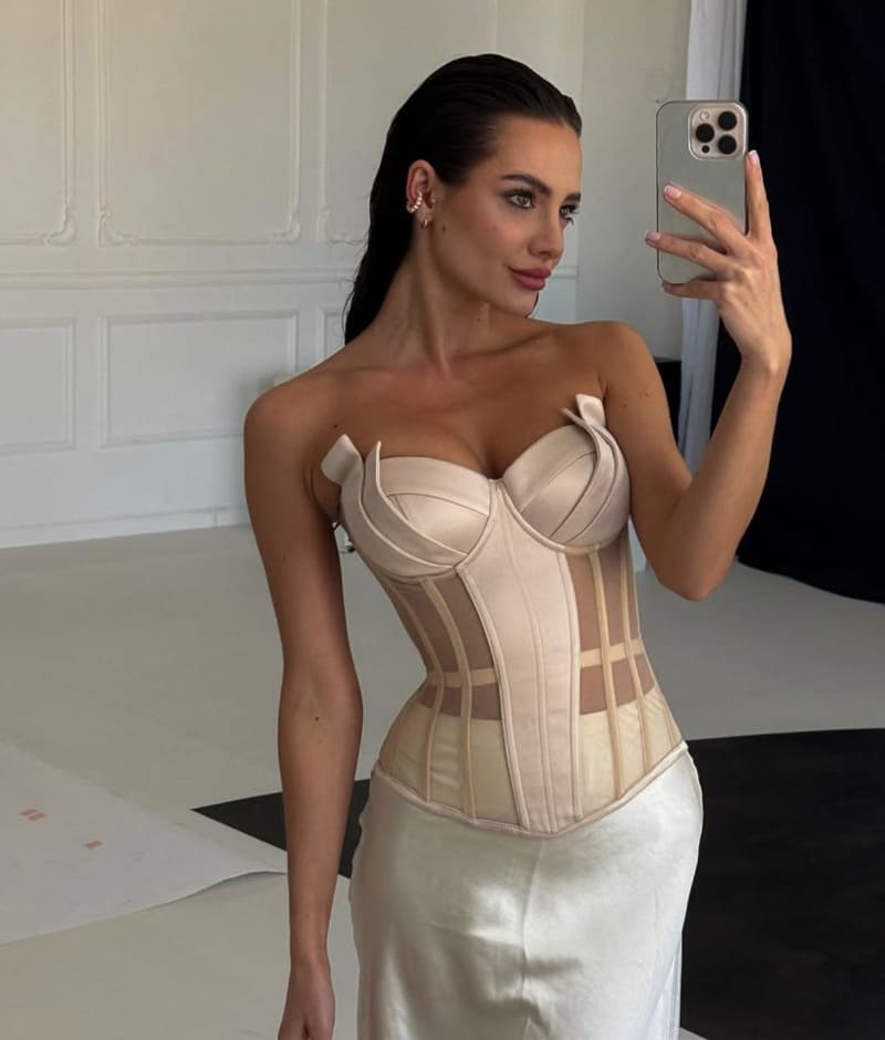 Simona in tight white outfit